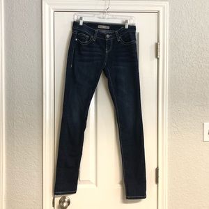 Buckle Skinny Jeans. Like new.